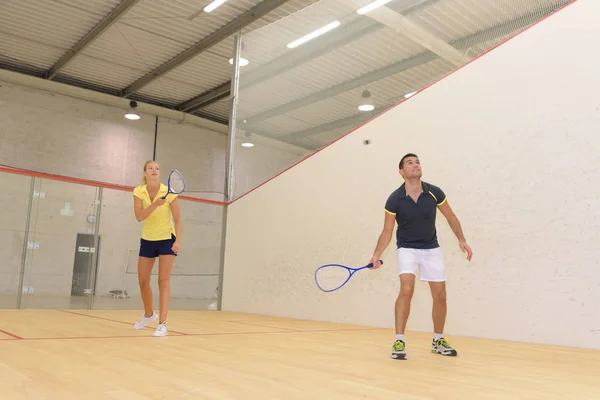 Pár hrát squash a squash — Stock fotografie