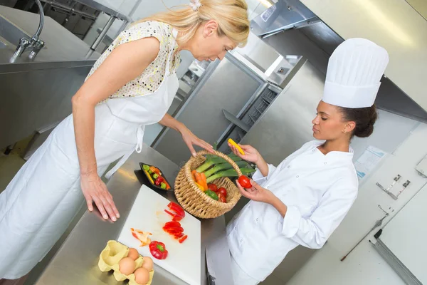 A young chef and work — Stock Photo, Image