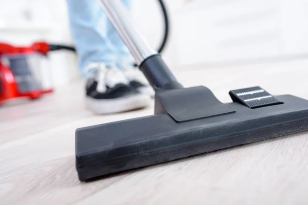 Closeup of vacuum on hard flooring — Stock Photo, Image
