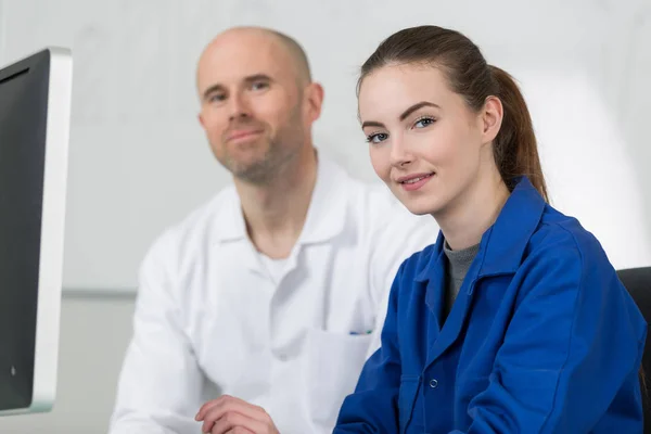 Portrait of confident teacher and female student — Stock Photo, Image