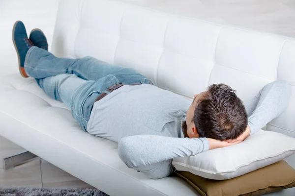 Relax man on a sofa — Stock Photo, Image