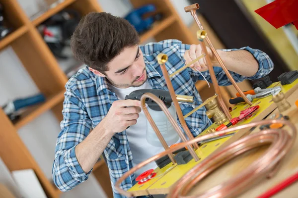 The copper tubes and work — Stock Photo, Image