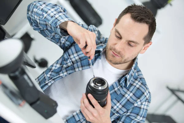 Fastställande av linsen och arbete — Stockfoto