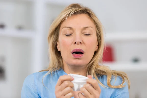 Sick mature attractive blond woman — Stock Photo, Image