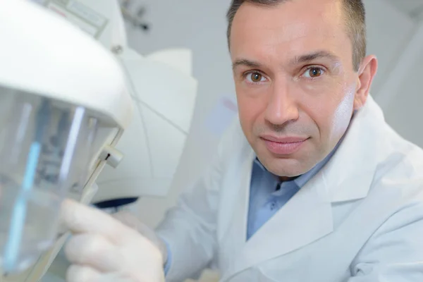 Happy young male researcher working in his lab — Stock Photo, Image