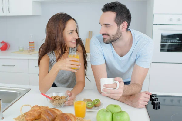 Couple eating breakfast and adult — Stock Photo, Image
