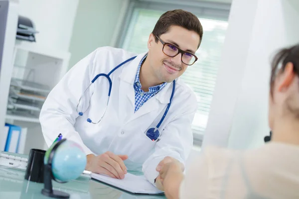 Doctor with patient and doctor — Stock Photo, Image