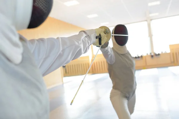 Fencer and postures and fencing — Stock Photo, Image