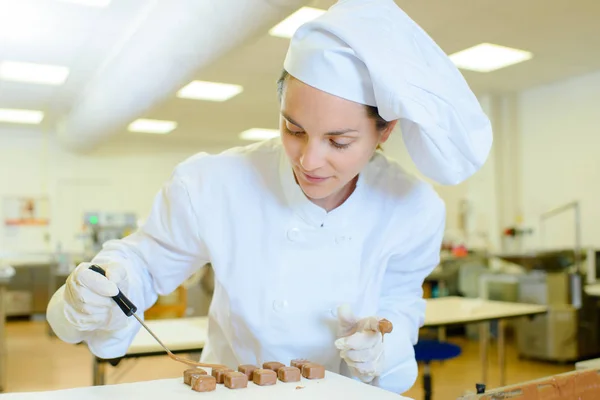 Adding the topping and one — Stock Photo, Image