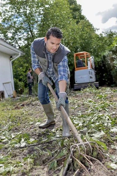 Hark de grond en de man — Stockfoto