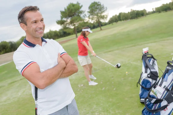 Golf pro arbetar som en lärare e — Stockfoto