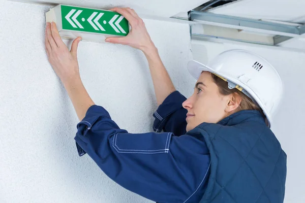 Young female engineer in workwear at work — Stock Photo, Image