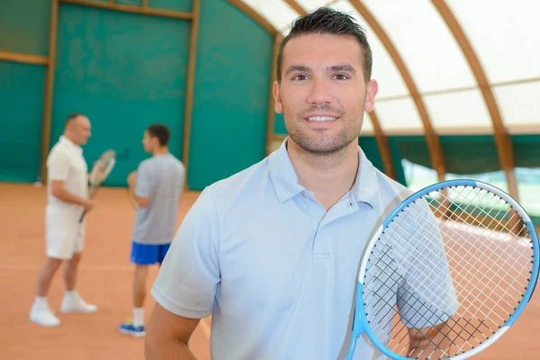 Tennis player and young — Stock Photo, Image