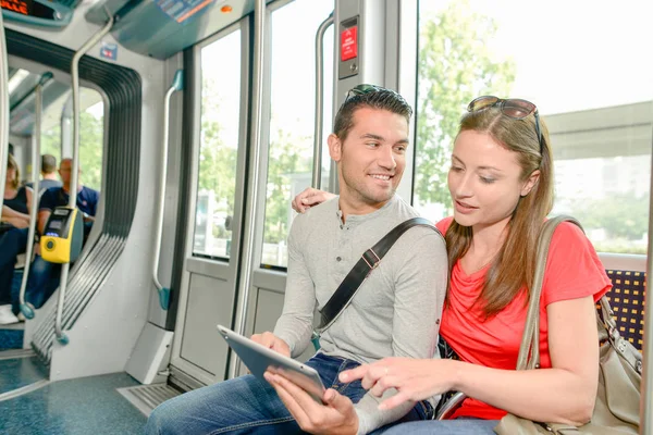 Man and woman on the tram — Stock Photo, Image