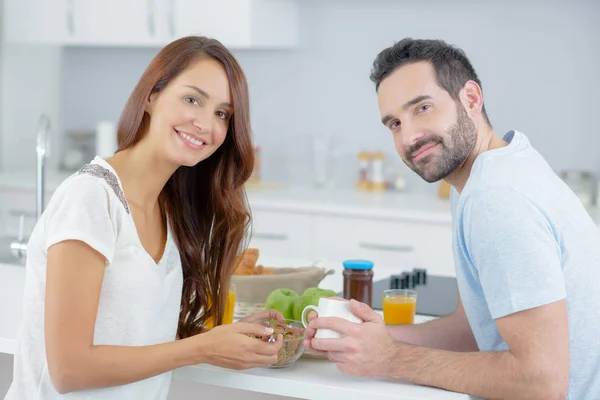 Couple in the kitchen — Stock Photo, Image