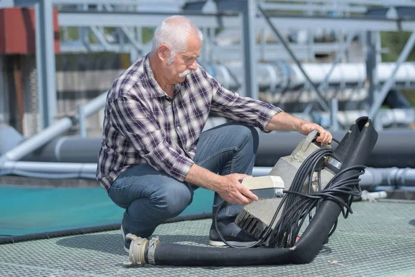 Bauarbeiter und Senior — Stockfoto