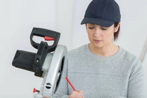 Creative housewife is sketching a furniture for her kids — Stock Photo, Image