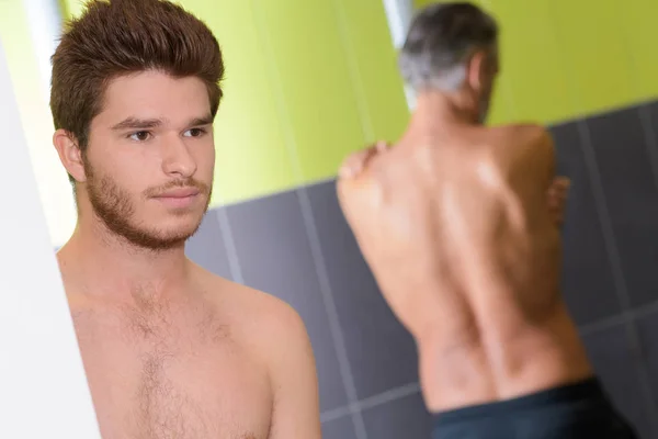 Gym shower area and men — Stock Photo, Image