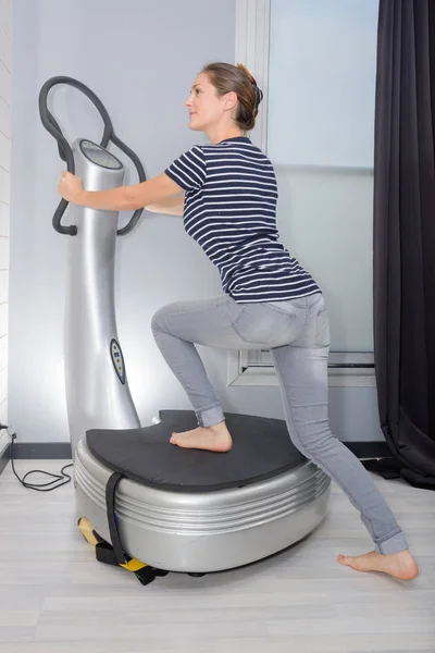 On an exercise machine — Stock Photo, Image