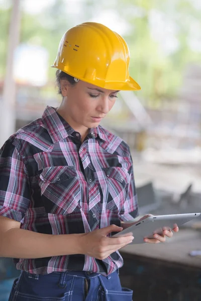 female worker using a tablet