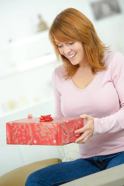 Joyful lady getting wonderful present — Stock Photo, Image