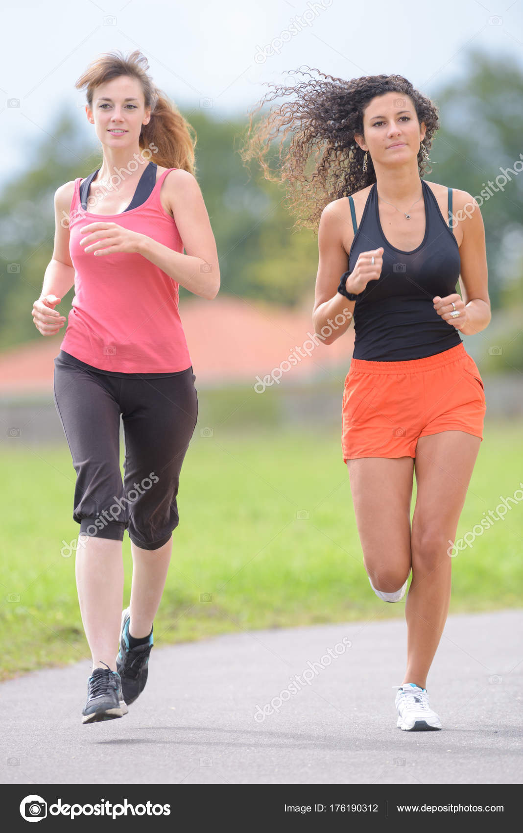 Two women jogging and run Stock Photo by ©photography33 176190312