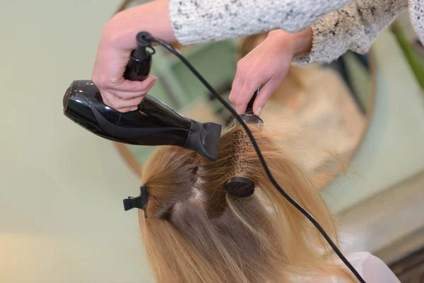 Hair dryer hair dryer in a beauty salon — Stock Photo, Image