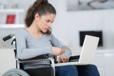 disabled lady buying online clipart