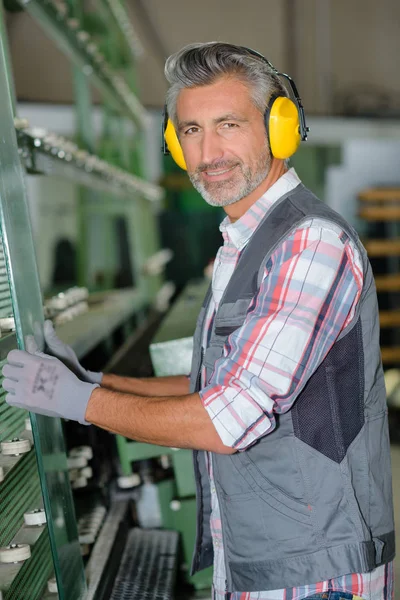 Man with ear protection — Stock Photo, Image