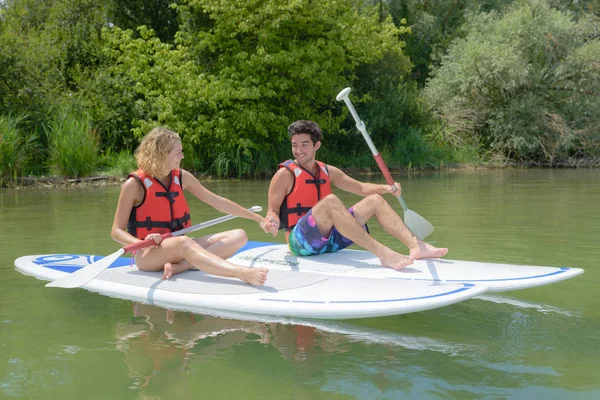 Första erfarenhet i paddleboarding — Stockfoto