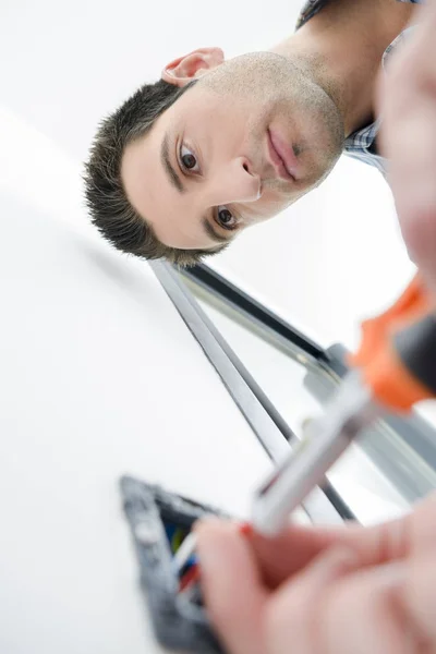 Changing a wall switch — Stock Photo, Image