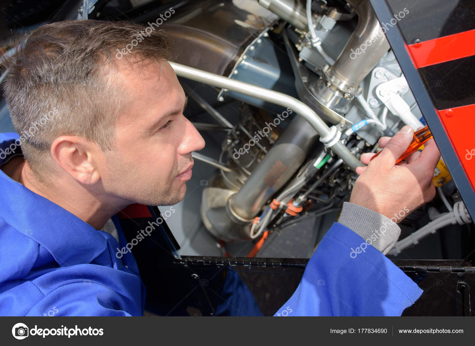 Avionics equipment mechanic and aircraft Stock Photo by ©photography33
