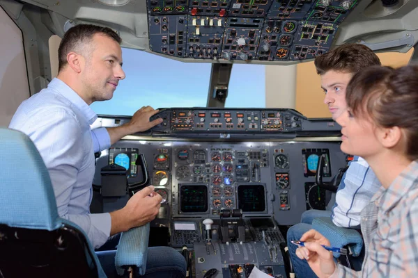 People in aircraft cockpit — Stock Photo, Image