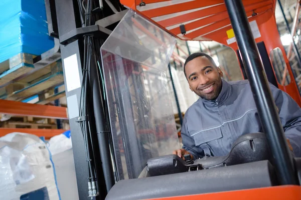 Portrait of man in forklift truck — Stock Photo, Image