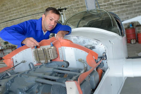 Checking on the engine — Stock Photo, Image