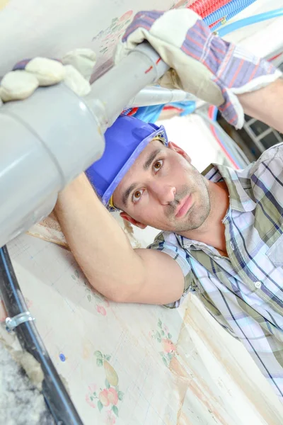 Man fitting pvc pipe — Stock Photo, Image