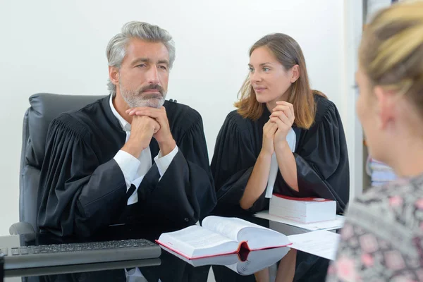 Team of lawyers consulting client in office — Stock Photo, Image