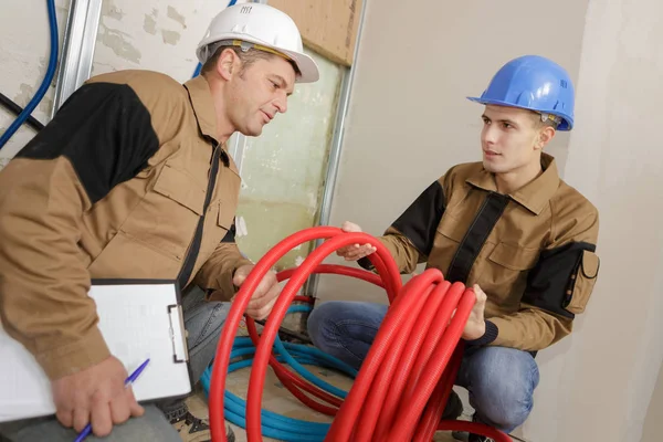 Portrait of a young plumber — Stockfoto