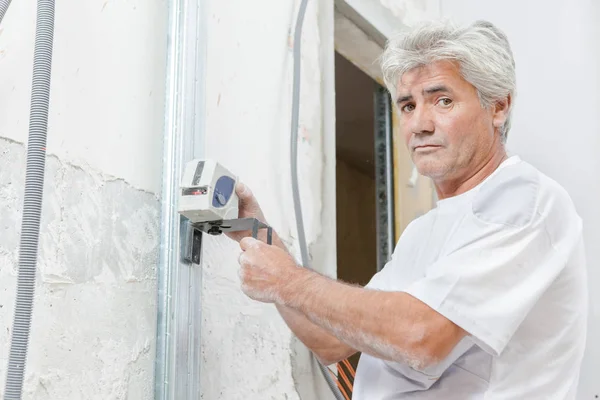 Builder and old  mature — Stock Photo, Image