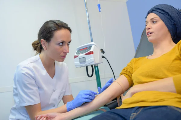 cancer patient being injected