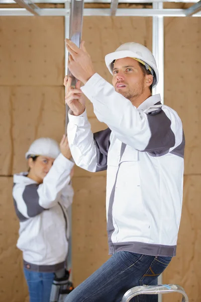 Installing the metal frames — Stock Photo, Image