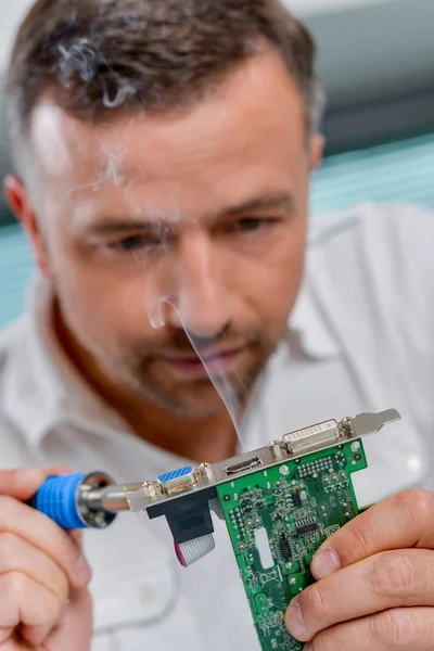 Soldering a video card — Stock Photo, Image