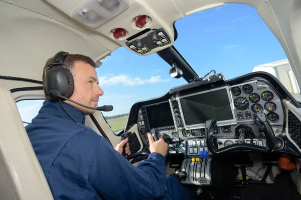 Rear view of male helicopter pilot — Stock Photo, Image