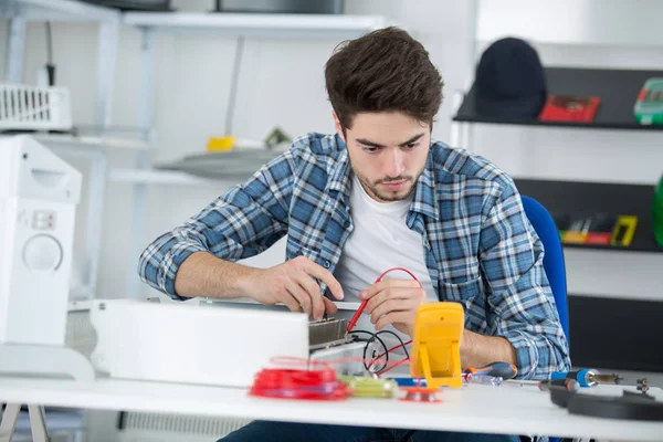 Engineer measuring multimeter panel board — Stock Photo, Image