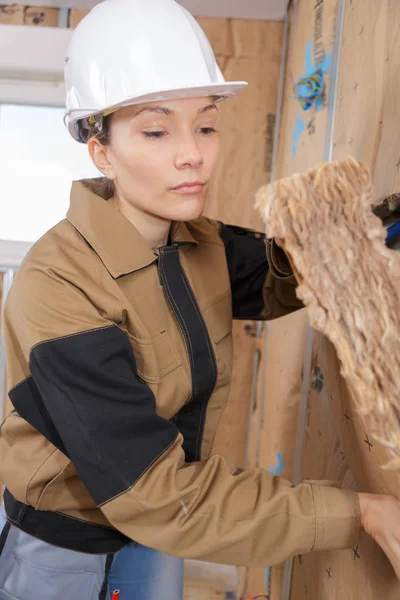 Closeup portrait of happy female construction worker at site — Stock Photo, Image