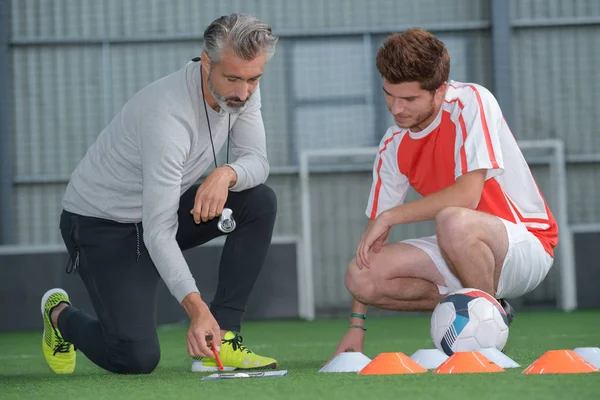 Pratica di calcio indoor e footbal — Foto Stock