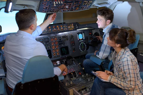 People in aircraft simulator — Stock Photo, Image