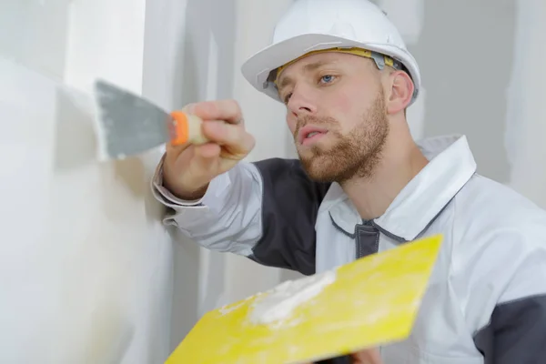 Closeup of plasterer working on wall — Stock Photo, Image