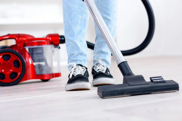 Vacuum cleaning the floor — Stock Photo, Image