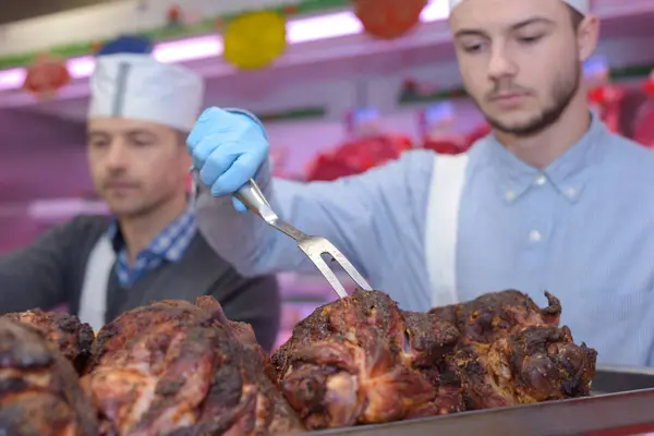 Tasty looking meat and work — Stock Photo, Image